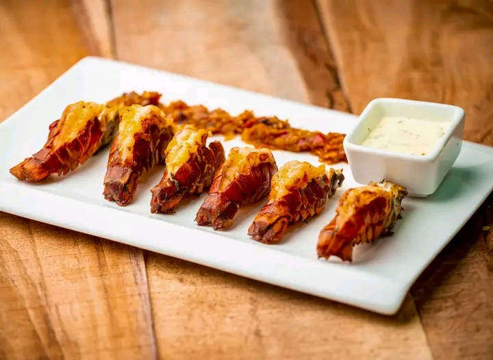 Grilled seafood tails with dipping sauce