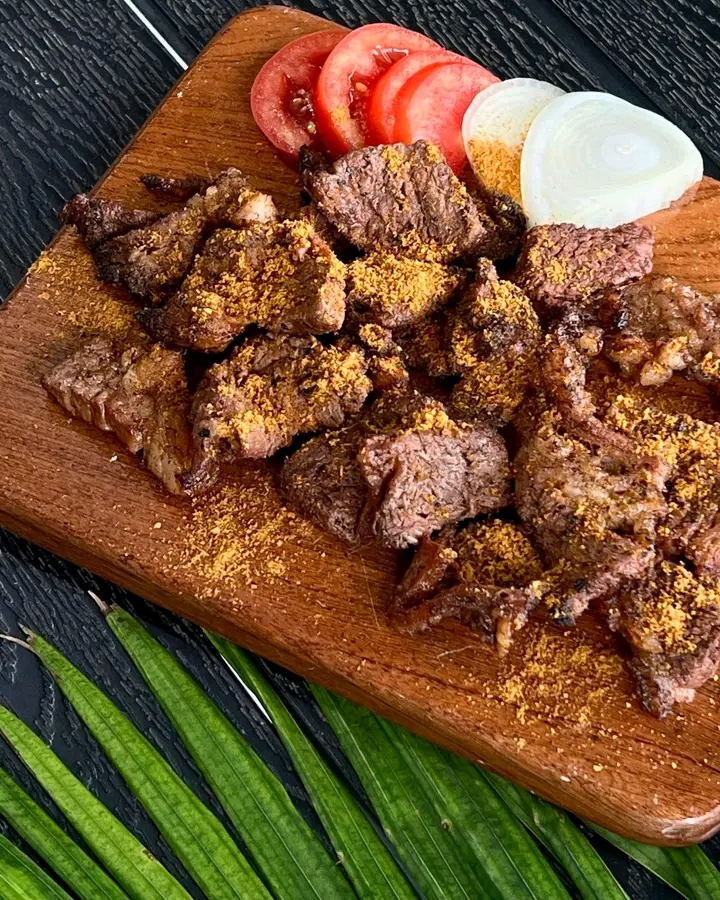 Suya platter with grilled beef strips